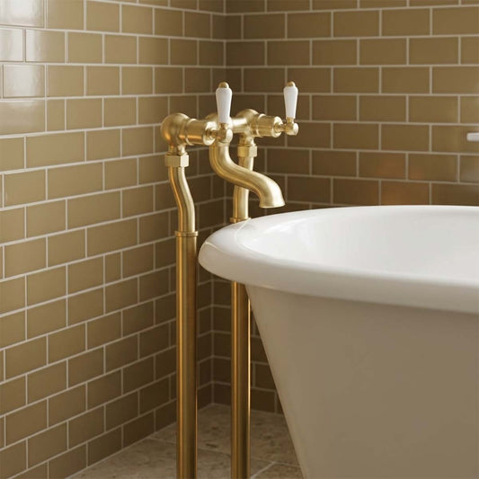 Brushed Brass Traditional Freestanding Bath Filler Tap with White Lever Handles brushed brass floorstanding bath filler with white ceramic levers