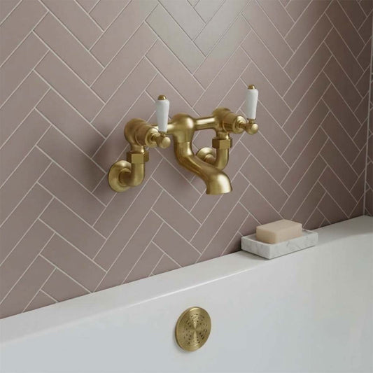 Brushed Brass Wall Mounted Bath Filler Tap with White Ceramic Lever Handles brushed brass wall mounted bath tap with ceramic lever handles