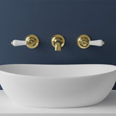 Traditional Wall Mounted Basin Mixer Tap with White Lever Handle - Polished Gold Traditional Basin Mixer Tap with White Lever Handle - Wall Mounted