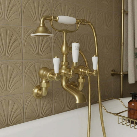 Brushed brass wall mounted bath tap 