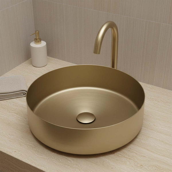 Brushed gold round counter top sink