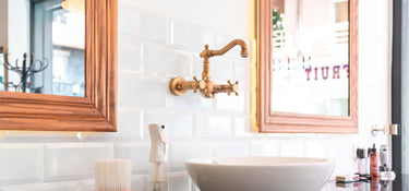 Elevate Your Bathroom Aesthetics with the 3 Hole Wall-Mounted Basin Mixer Tap Crosshead in Brushed Brass
