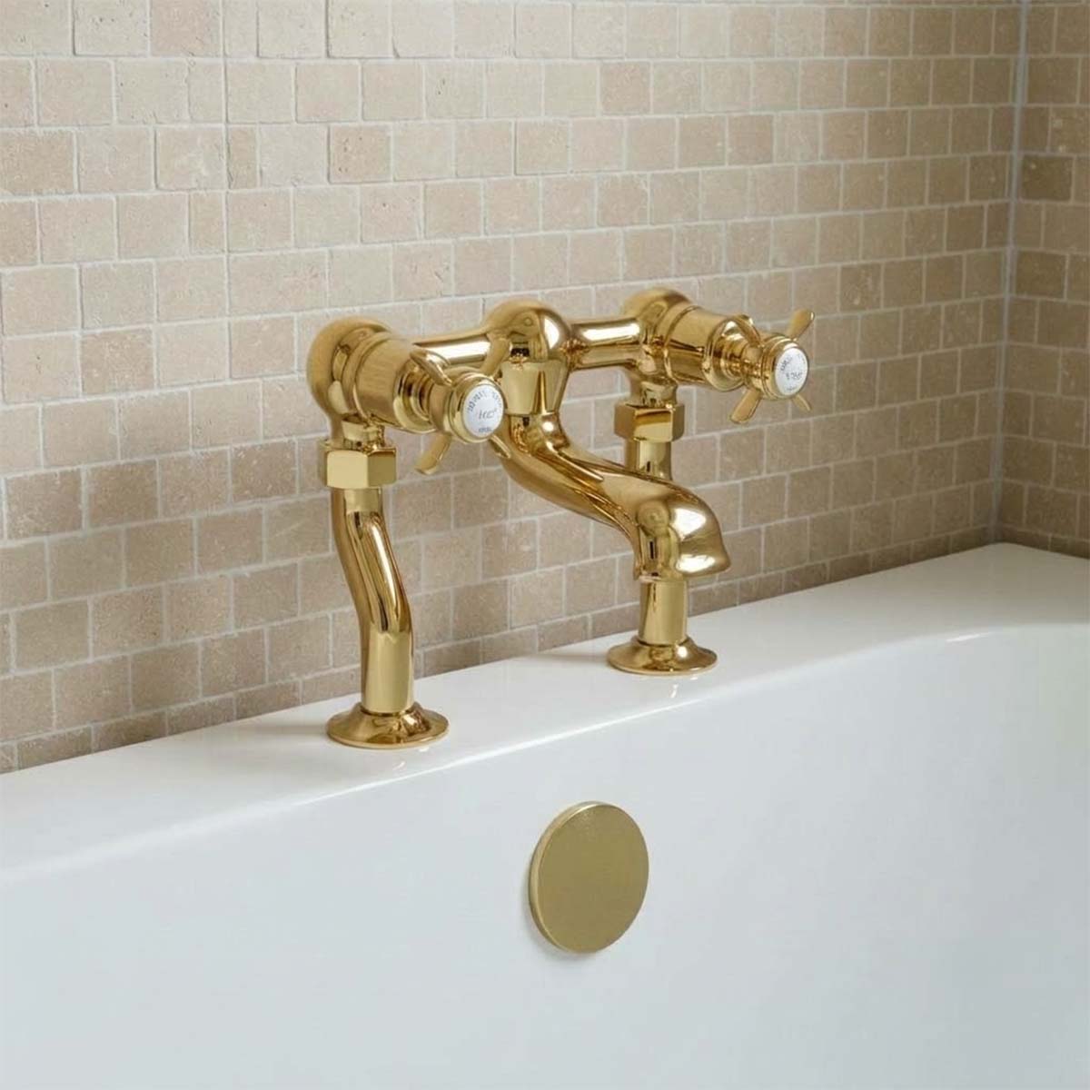 Traditional Gold deck mounted bath tap with pich handles