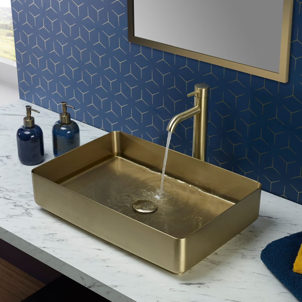 High rise brass gold basin tap with gold countertop basin