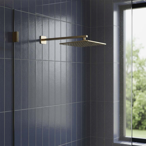 brushed brass long wall mounted shower arm 