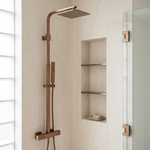 brushed bronze exposed thermostatic shower valve with rigid riser and handset