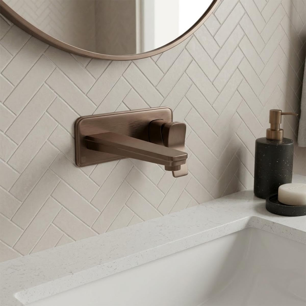 brushed bronze wall mounted basin tap