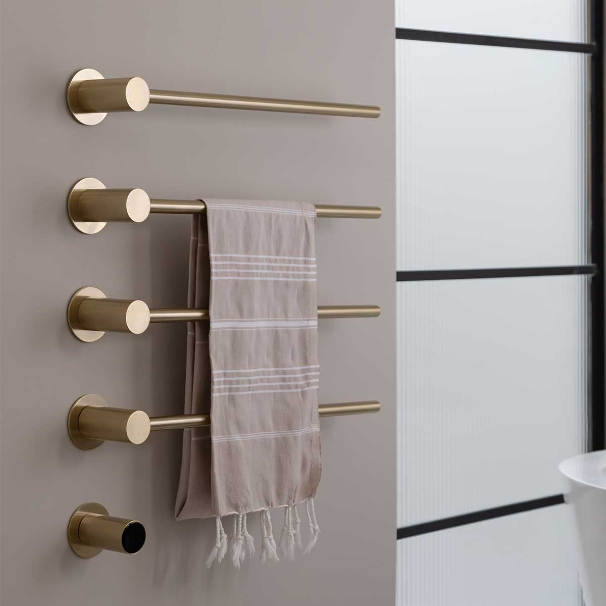 brushed gold heated towel rail