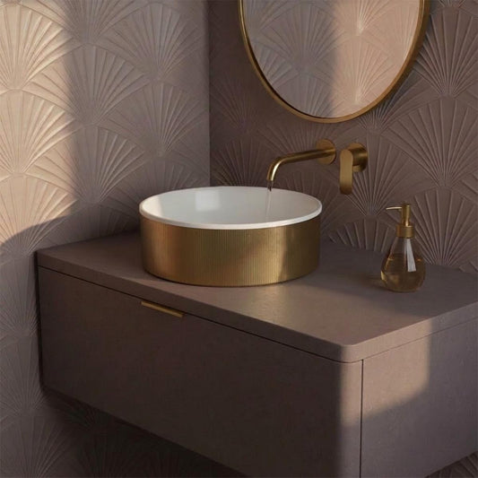 gold countertop vassel made of ceramic and stainless steel